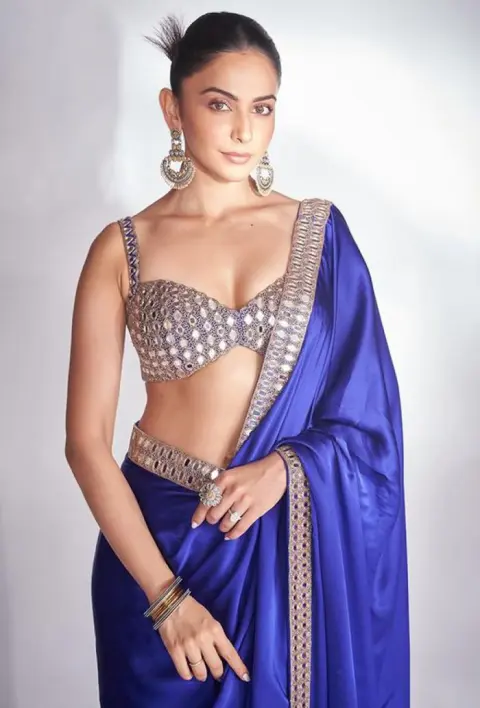 Elegant salwar kameez model showcasing bridal wear