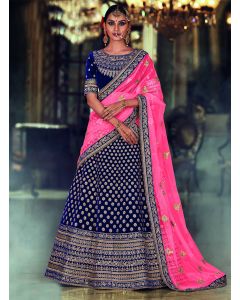 Blue color Velvet Lehenga Choli with Pink Net Dupatta