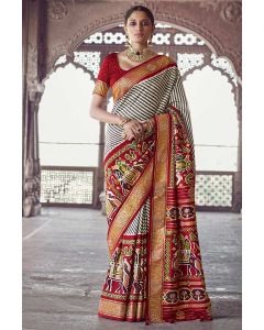 Cream Colour Patola Silk Saree and Red Blouse