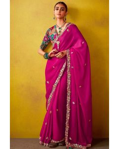 Handcrafted silk saree with zardozi embroidery in fuchsia pink for EID and festive occasions.