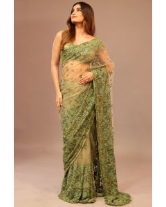  Full front view of olive green net saree with all-over sequin floral embroidery and sheer detailing.

