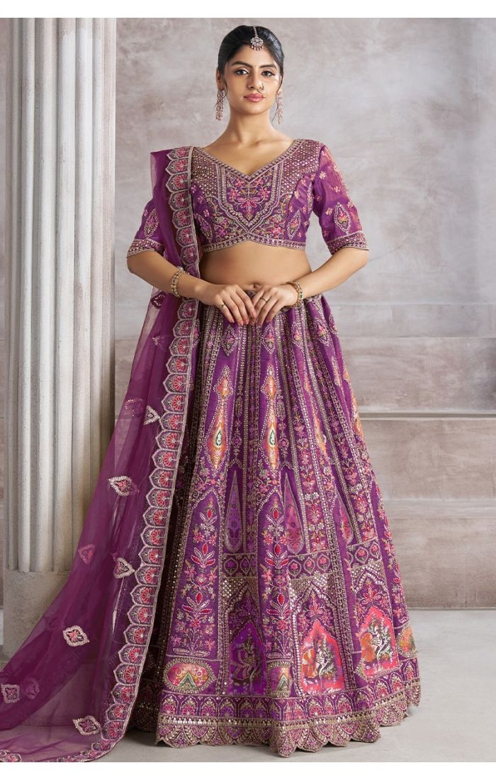 Bridesmaid in Soft Net Berry Purple Lehenga with intricate patchwork and embroidered blouse – Appelle Fashion