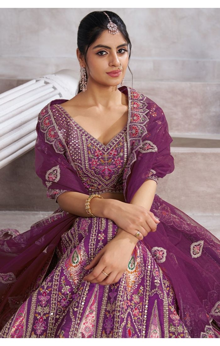 Close-up of aari and sequin embroidery on Berry Purple lehenga choli for weddings and sangeet – Appelle Fashion