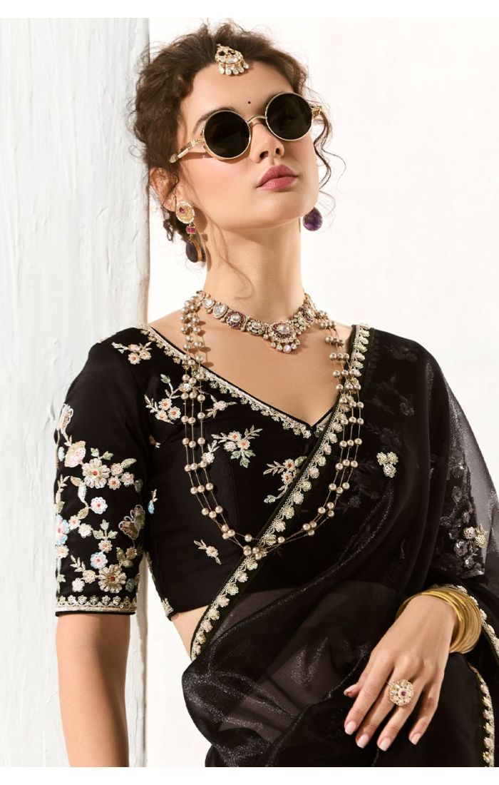 Front upper view highlighting neckline, blouse embroidery, and accessories