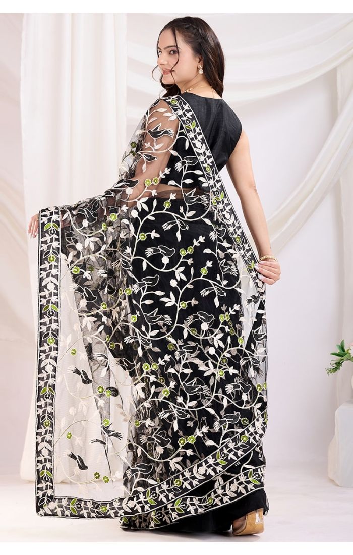  Stunning black soft net embroidered saree with mono banglori blouse perfect for weddings and festivals.