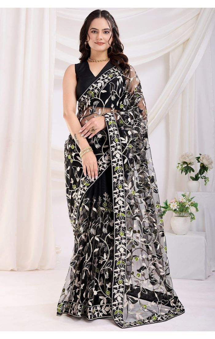 Black soft net saree with thread embroidery work and mono banglori blouse perfect for weddings and parties.