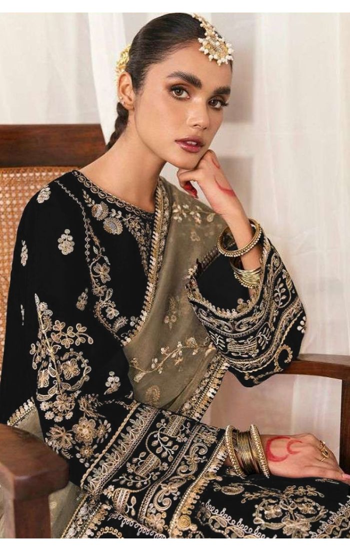 Black velvet zari embroidered salwar suit with olive net dupatta for festive occasions