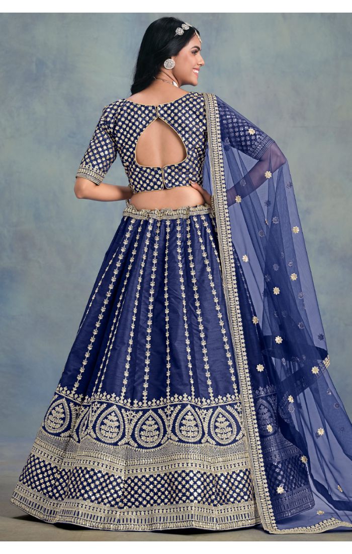 Detailed neckline and embroidery of Blue Art Silk Lehenga Choli