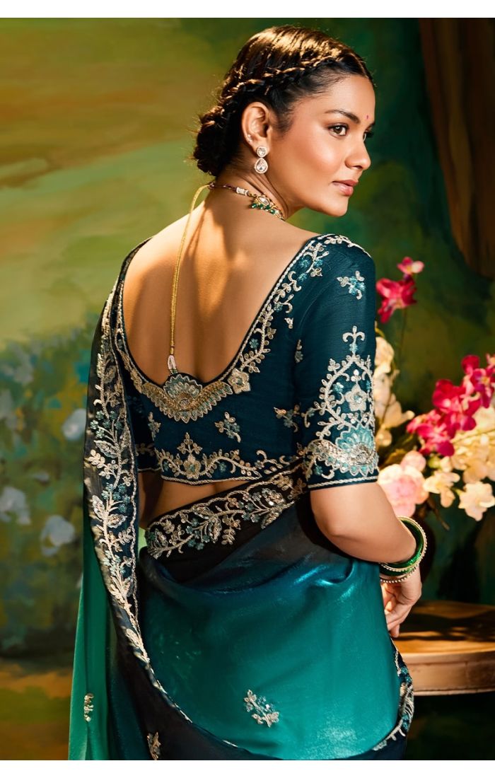 Side drape showing lace border and blouse embroidery
