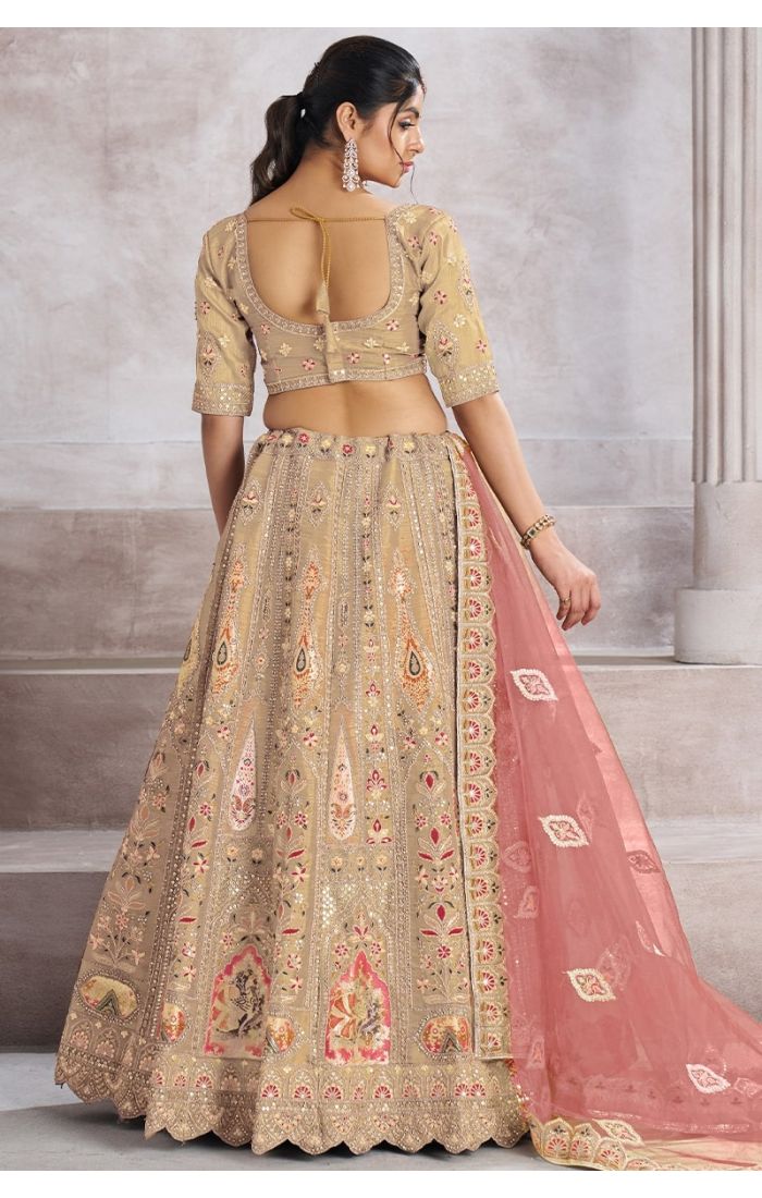 Back view showing lehenga’s generous gher and delicate patchwork