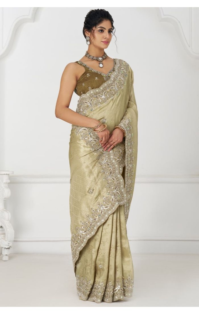 Elegant Champagne Silk Saree with Intricate Embroidery – Side Profile View