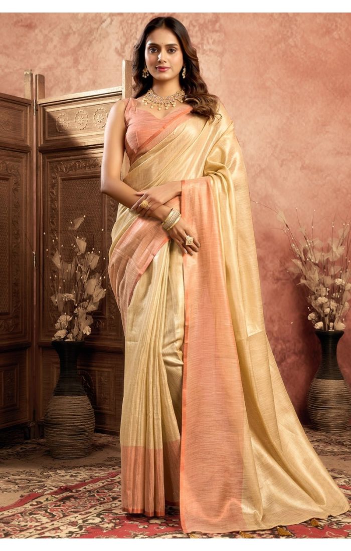  Front view of Chiku Plain Tissue Saree draped elegantly