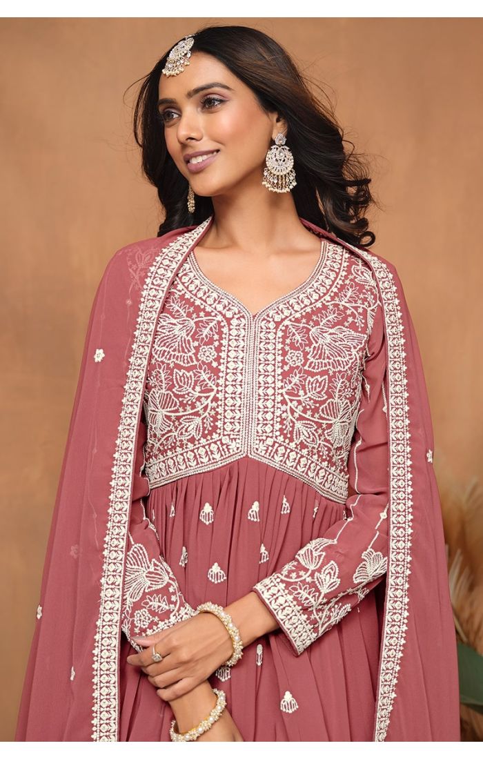 Close-up of neckline and front embroidery on red sharara suit.