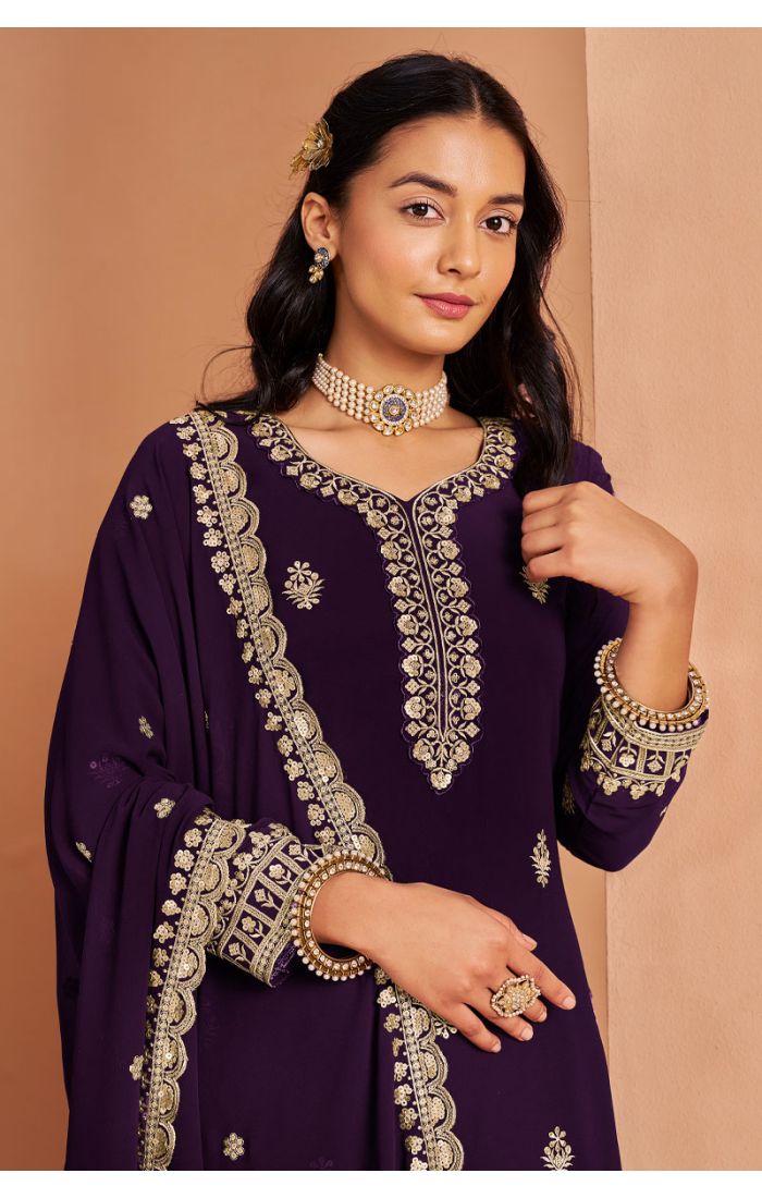 Front view of purple Georgette embroidered salwar suit showcasing detailed neckline and palazzo design for festive occasions