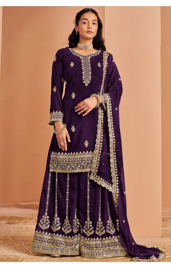 Detailed close-up of purple Georgette salwar suit neckline and sleeve heavy embroidery work
