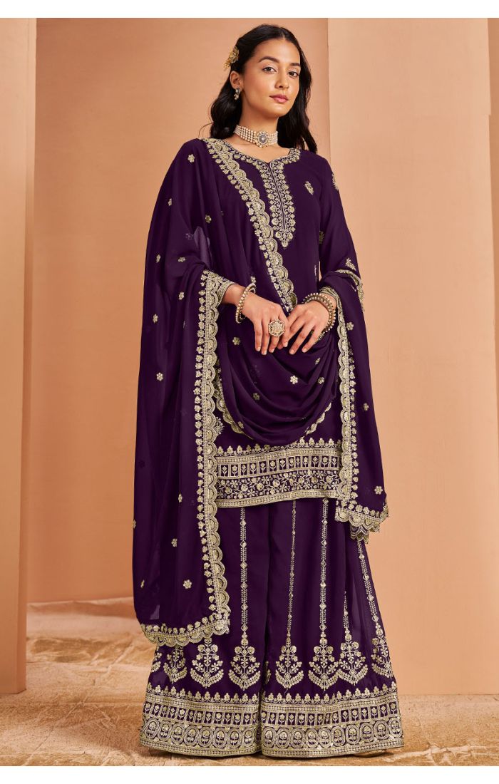 Purple Georgette Salwar Suit with heavy golden embroidery and ornate dupatta, perfect for party and festive wear