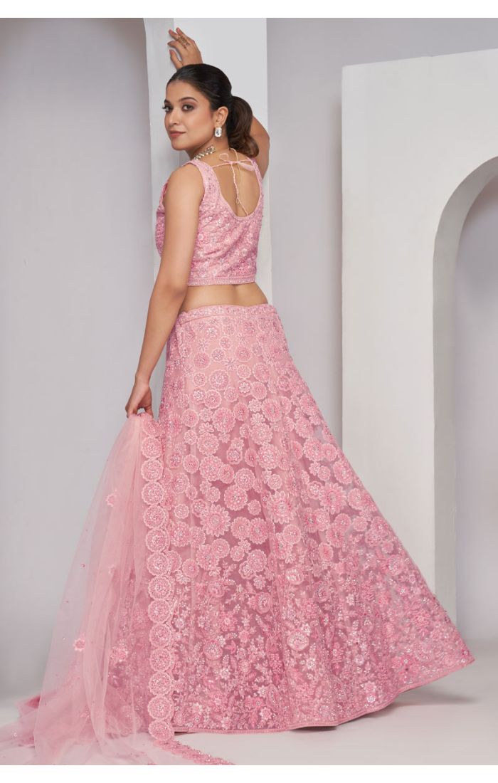 Elegant Pink Embroidered Net Bridal Lehenga with Floral Detailing.-