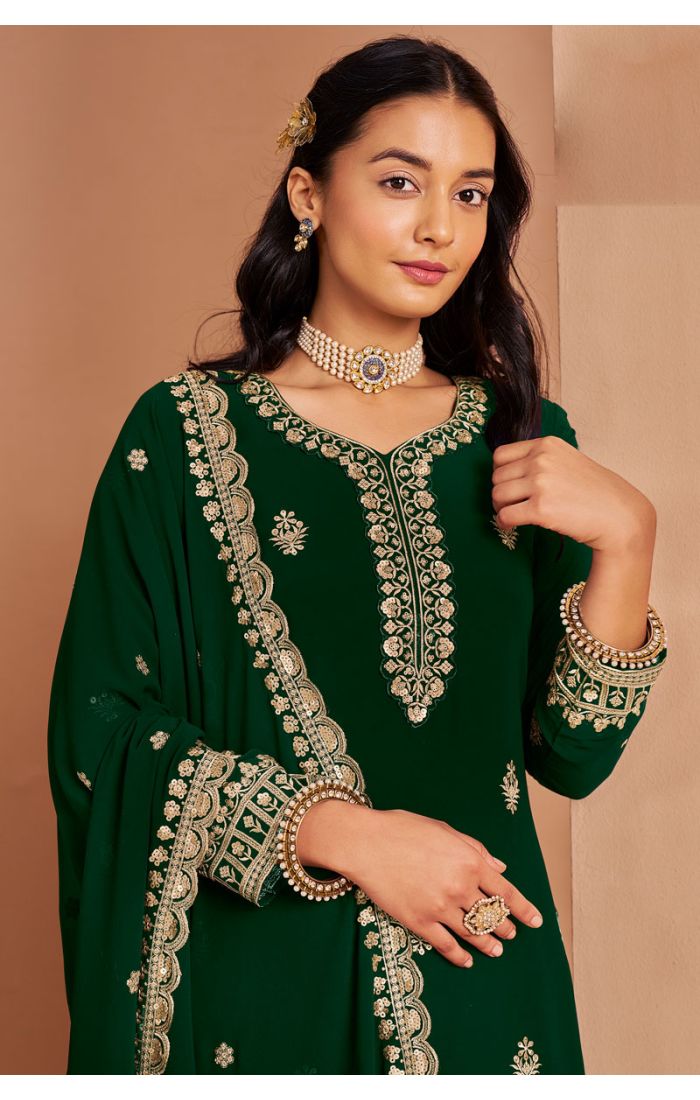 Close-up of embroidery and neckline of emerald green georgette salwar suit