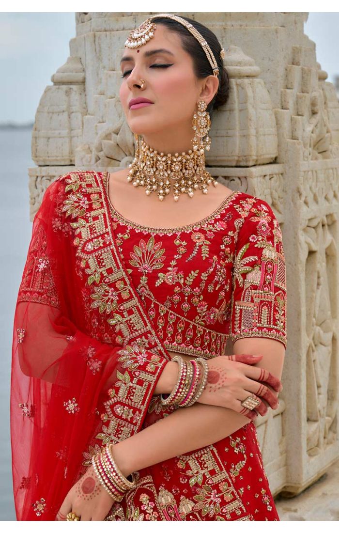 Exquisite red bridal lehenga with Zardosi embroidery and architectural design, ideal for weddings and special occasions Get at Best Price in UK