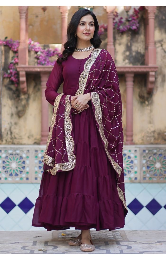 Elegant woman in wine purple georgette long gown with sequins-embellished dupatta, ideal festive wedding ethnic wear for USA, Canada, UK, Europe