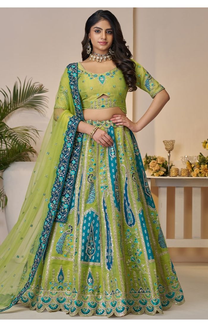  Full standing pose showcasing the grandeur of the lehenga skirt and blouse details.