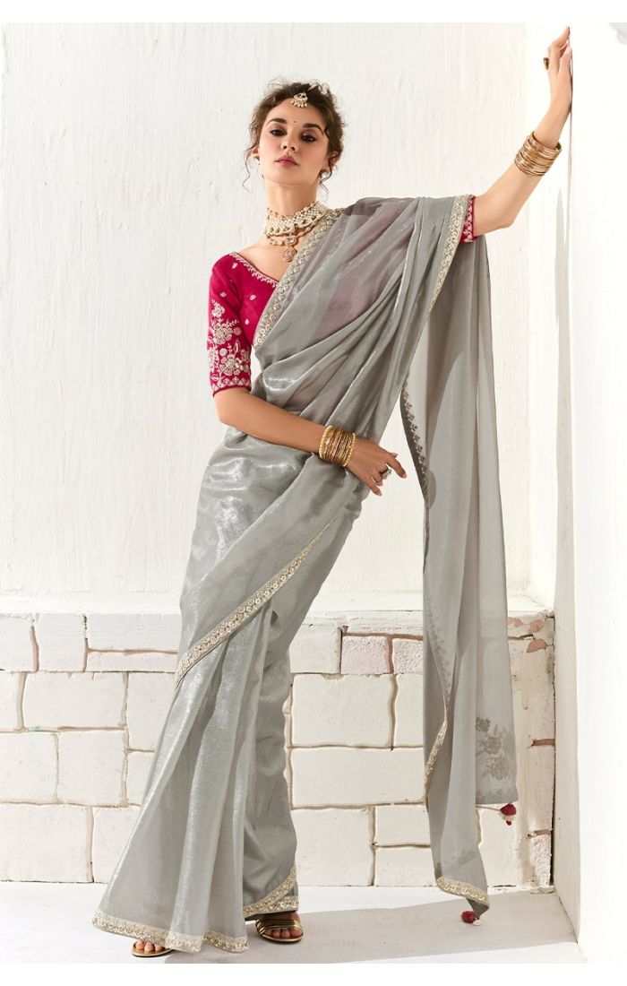 Grey zari and stone work saree with magenta silk blouse – side pose view