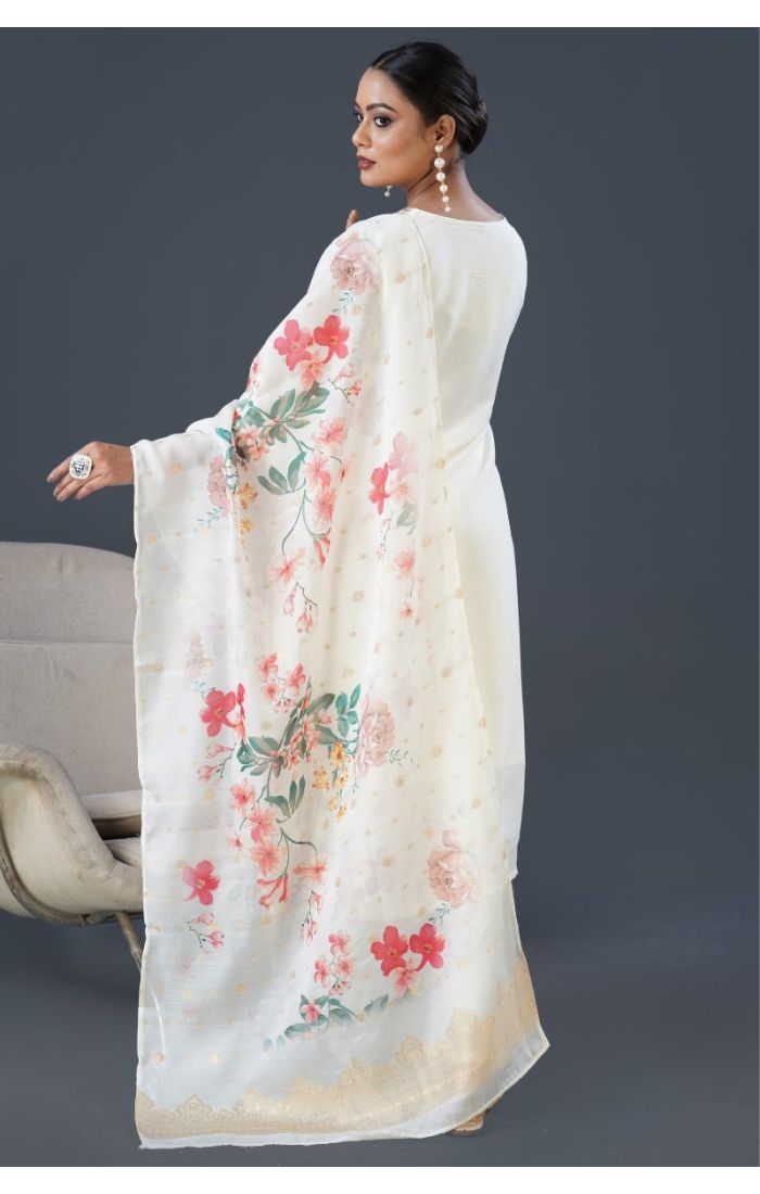 Model wearing ivory cotton kurta set with floral dupatta