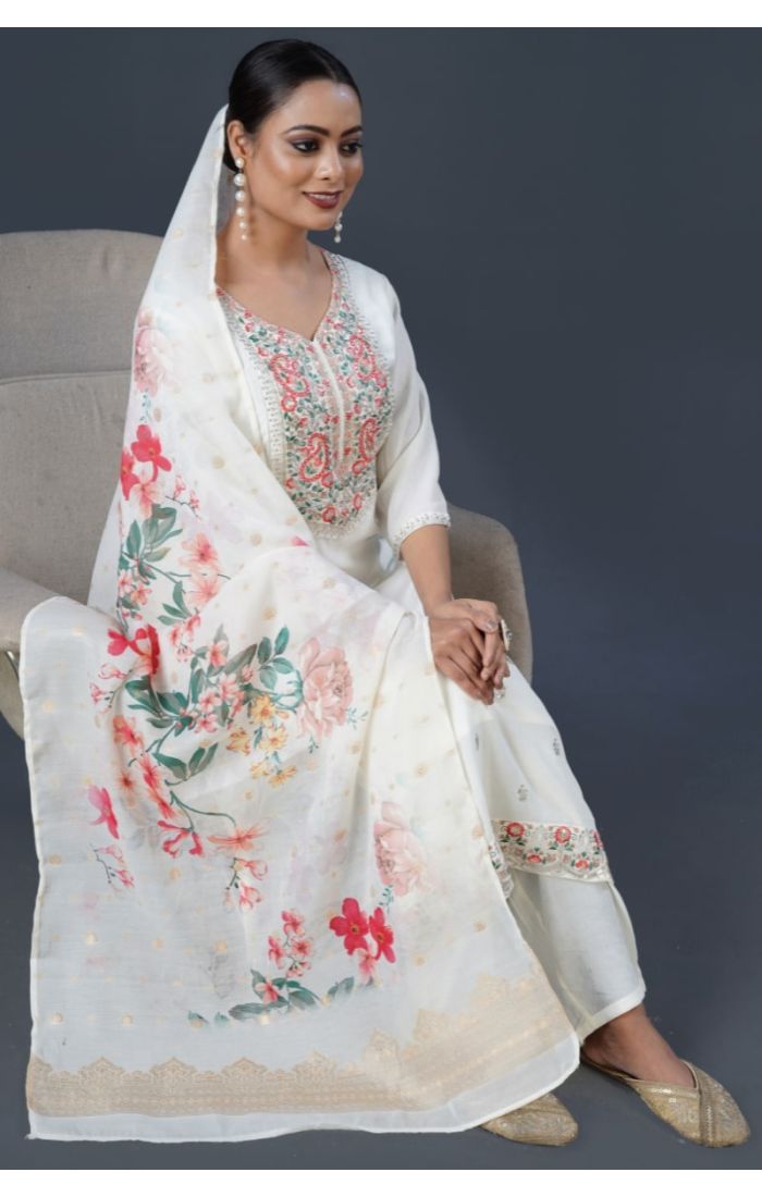 Model wearing ivory cotton kurta set with floral dupatta