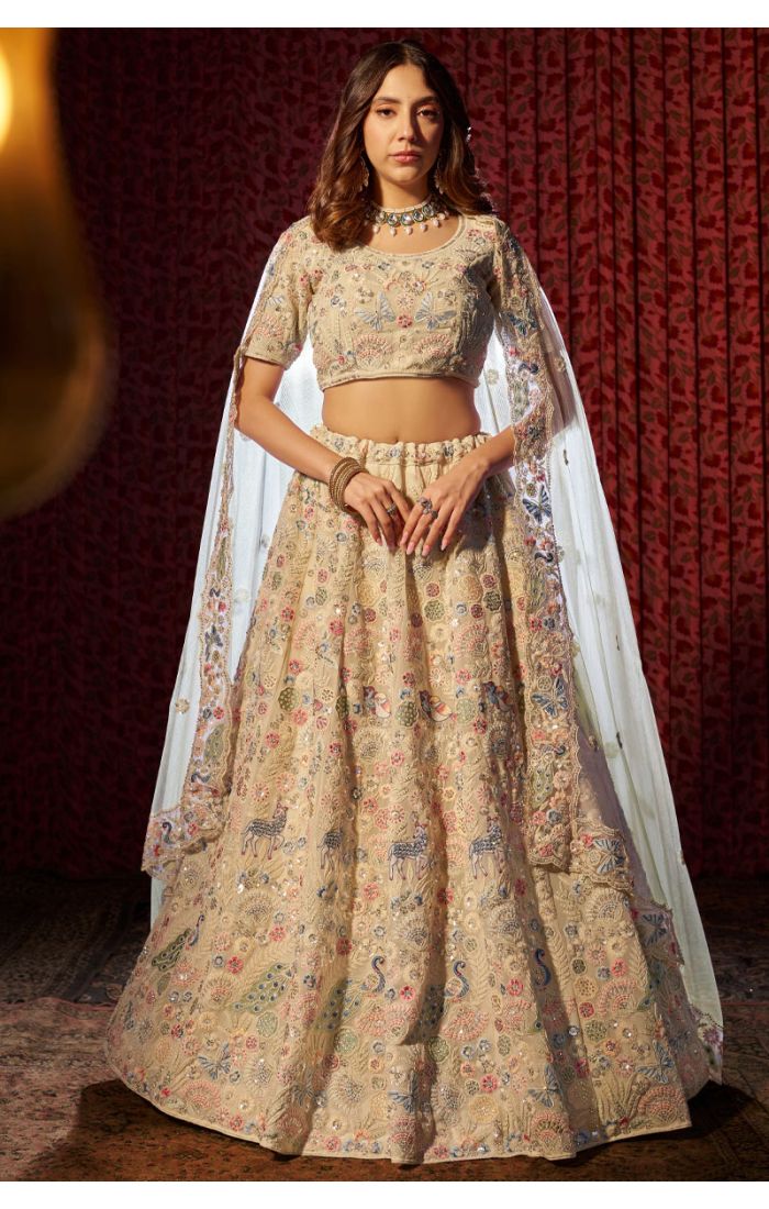 Buy Ivory Multi-Colored Embroidered Net Lehenga Choli with Dupatta in Canada and Australia