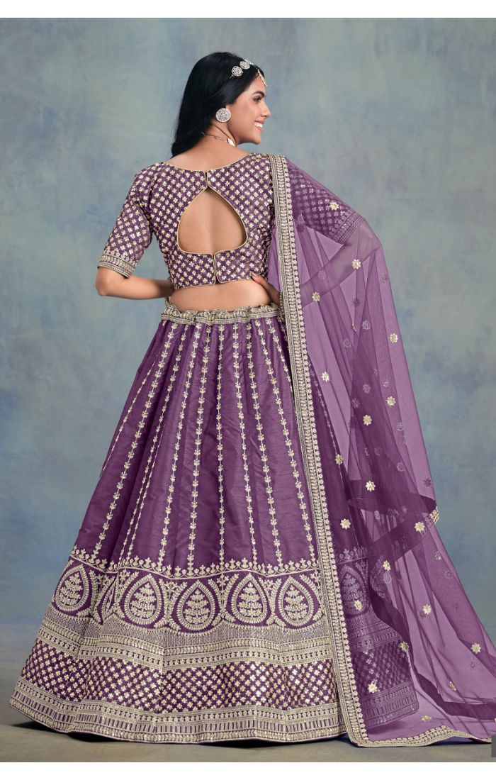 Model wearing lavender art silk lehenga choli - Back