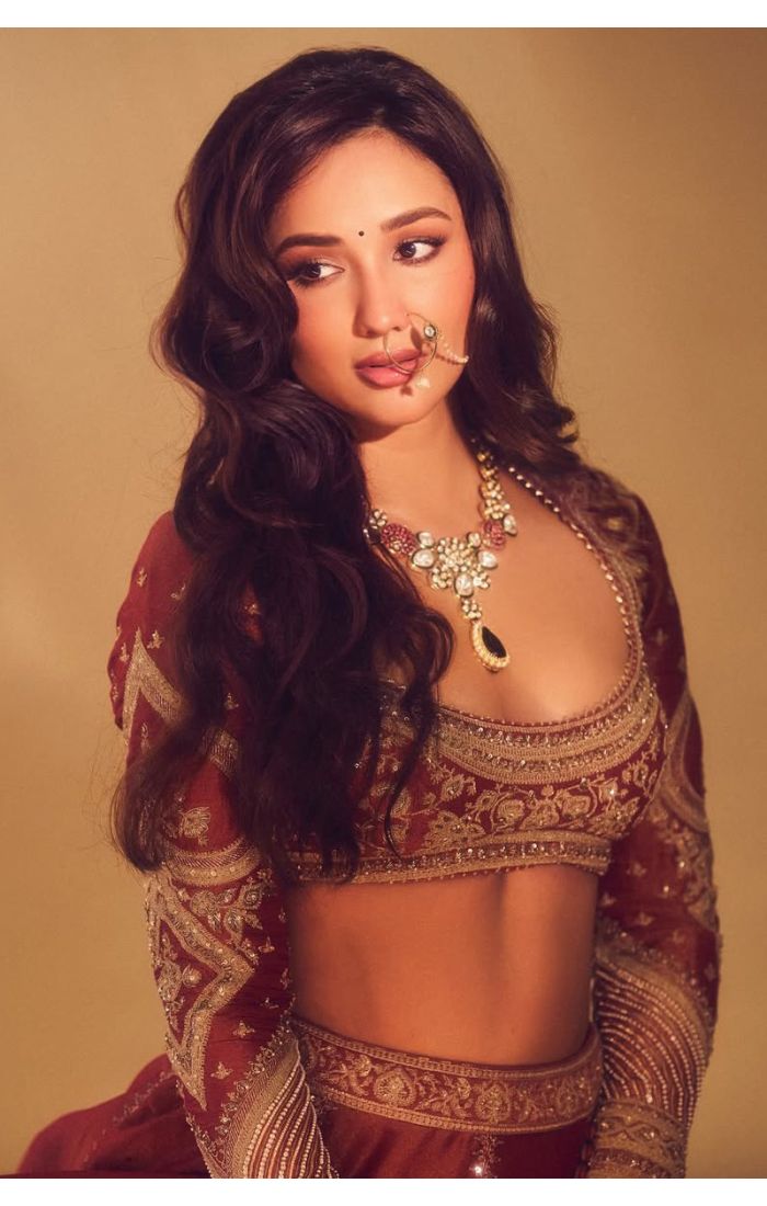 Close-up of Embroidered Blouse – Maroon Net Lehenga