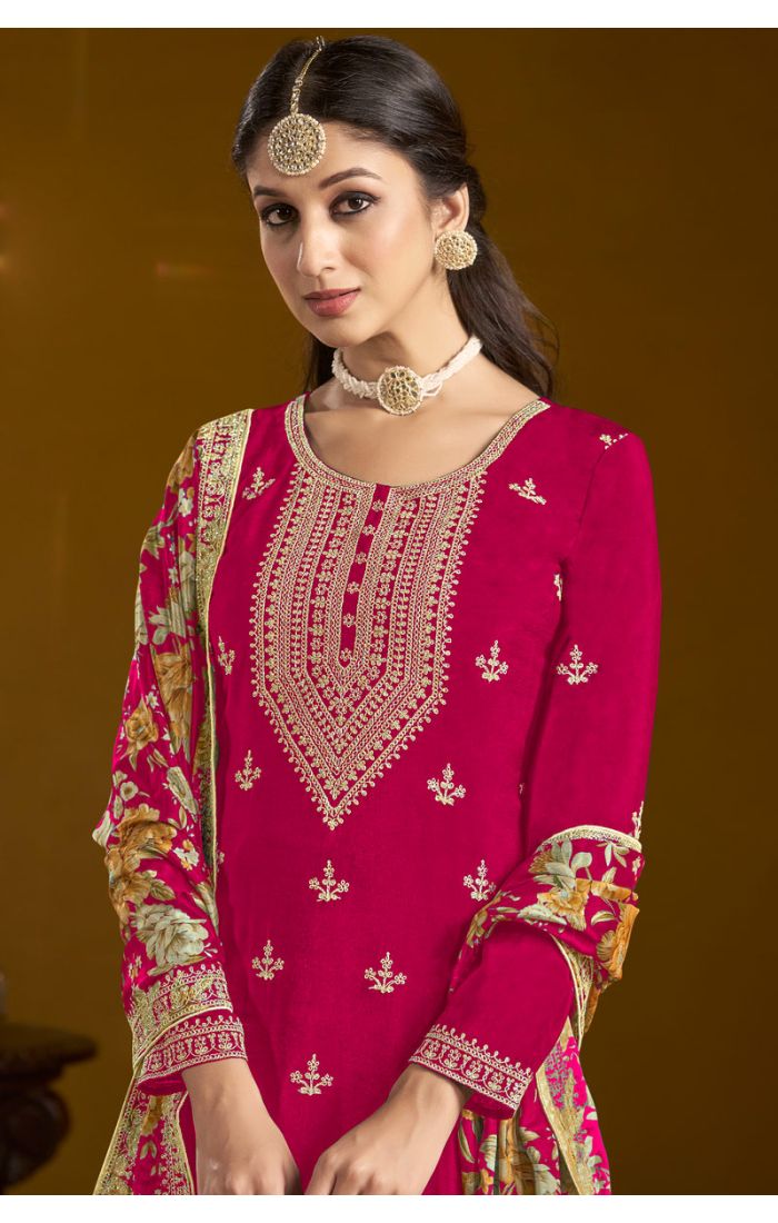 Close-up view of embroidery and neckline of Maroon festive sharara suit
