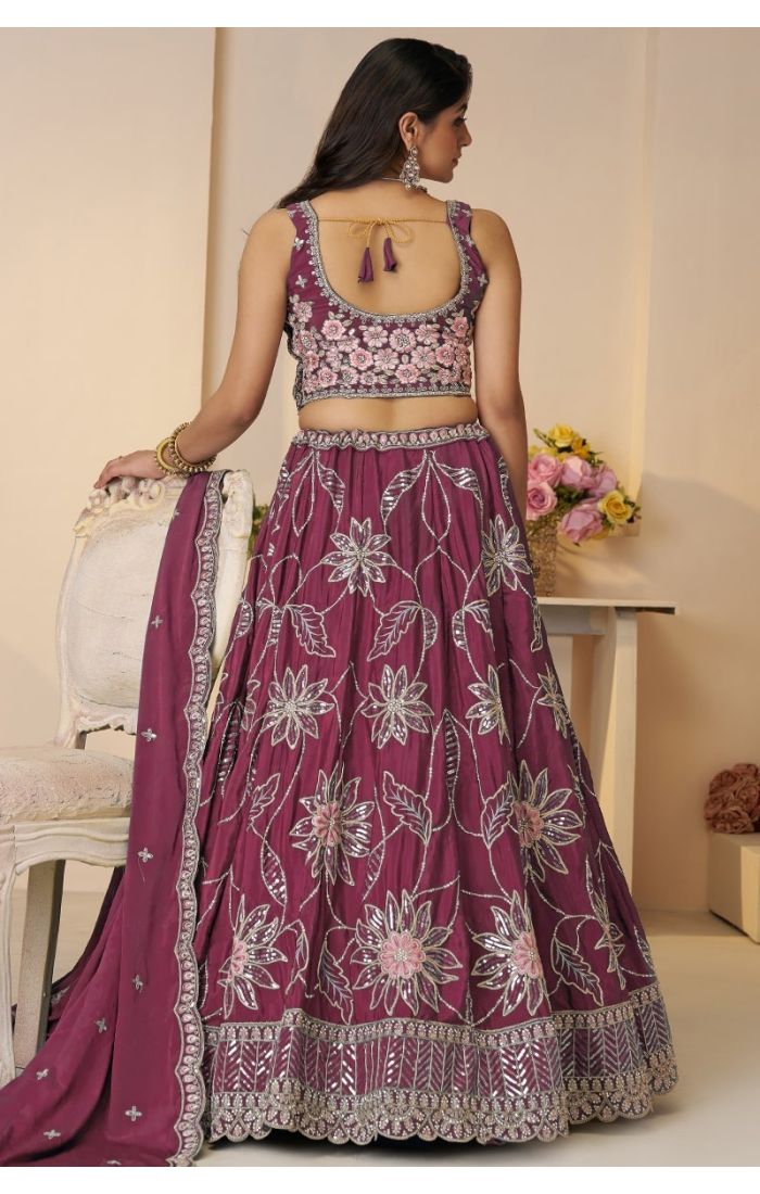 Back view of maroon soft net lehenga with floral motifs and scoop back blouse, ideal bridesmaid attire for mehendi – USA UK Canada ethnic clothing