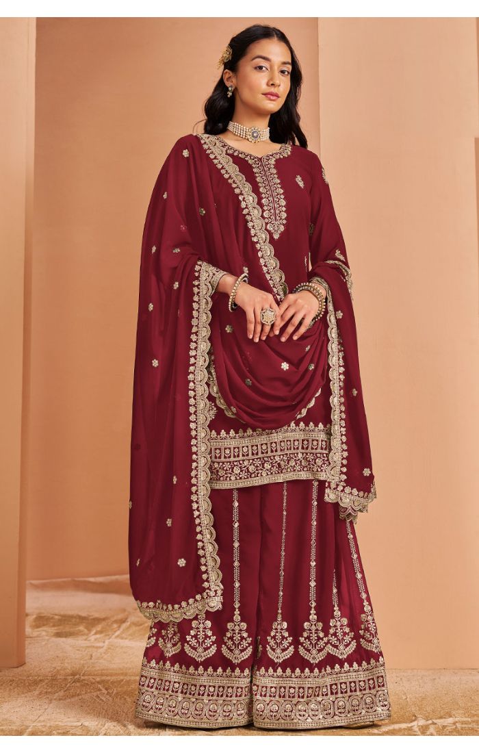 Maroon georgette salwar suit with heavy golden embroidery, front view