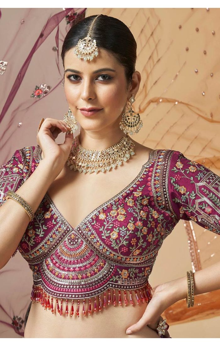 Close-up of maroon silk embroidered bridal choli with V neckline – LEHV4131