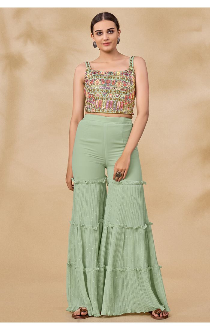 Front close-up view of mint green georgette Navratri set with embroidered square neck crop top