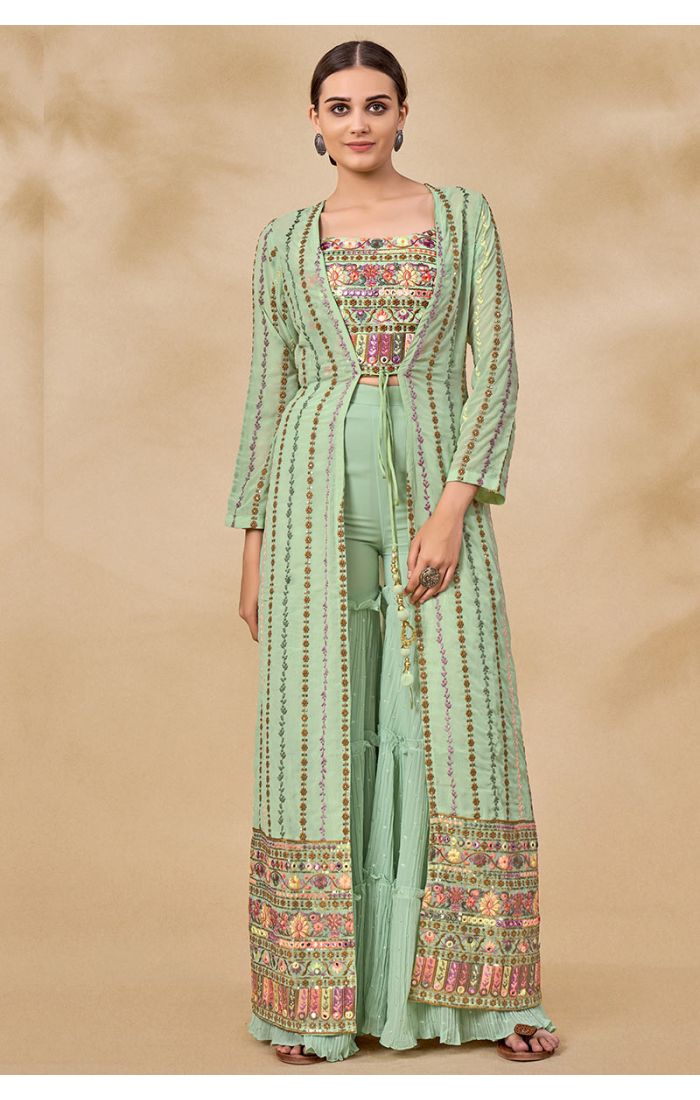 Front close-up view of mint green georgette Navratri set with embroidered square neck crop top