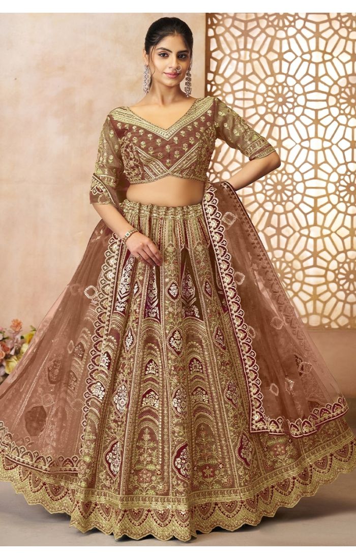Full front pose of bride wearing mocha color embroidered Banarasi lehenga