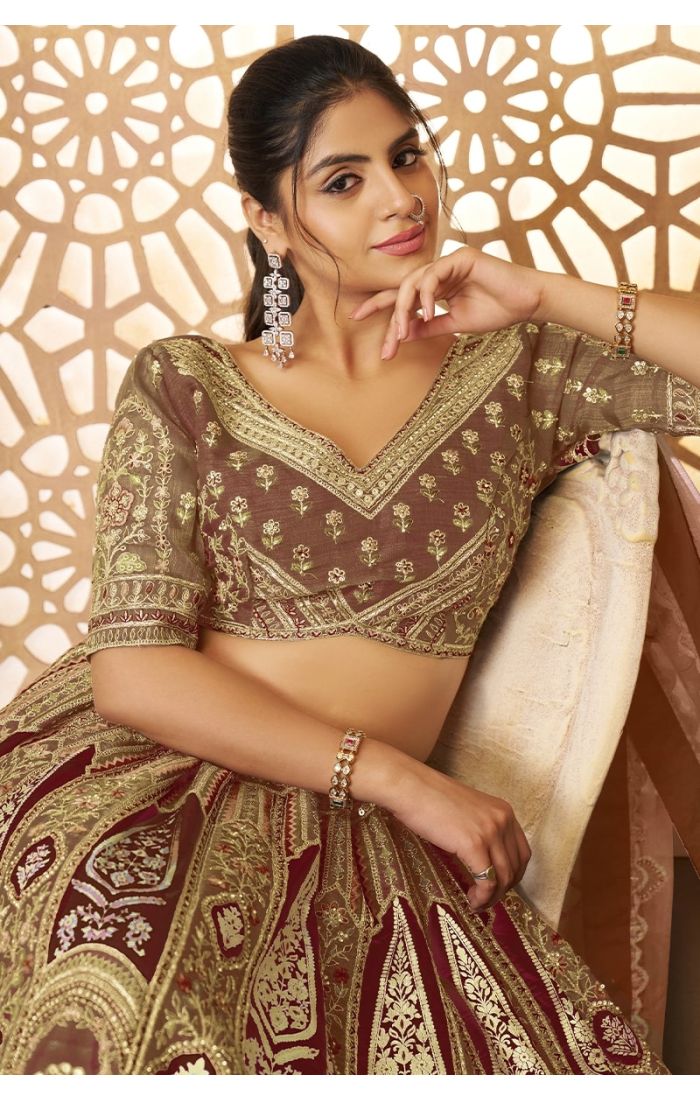  Close-up of blouse design with detailed embroidery and V-neck cut