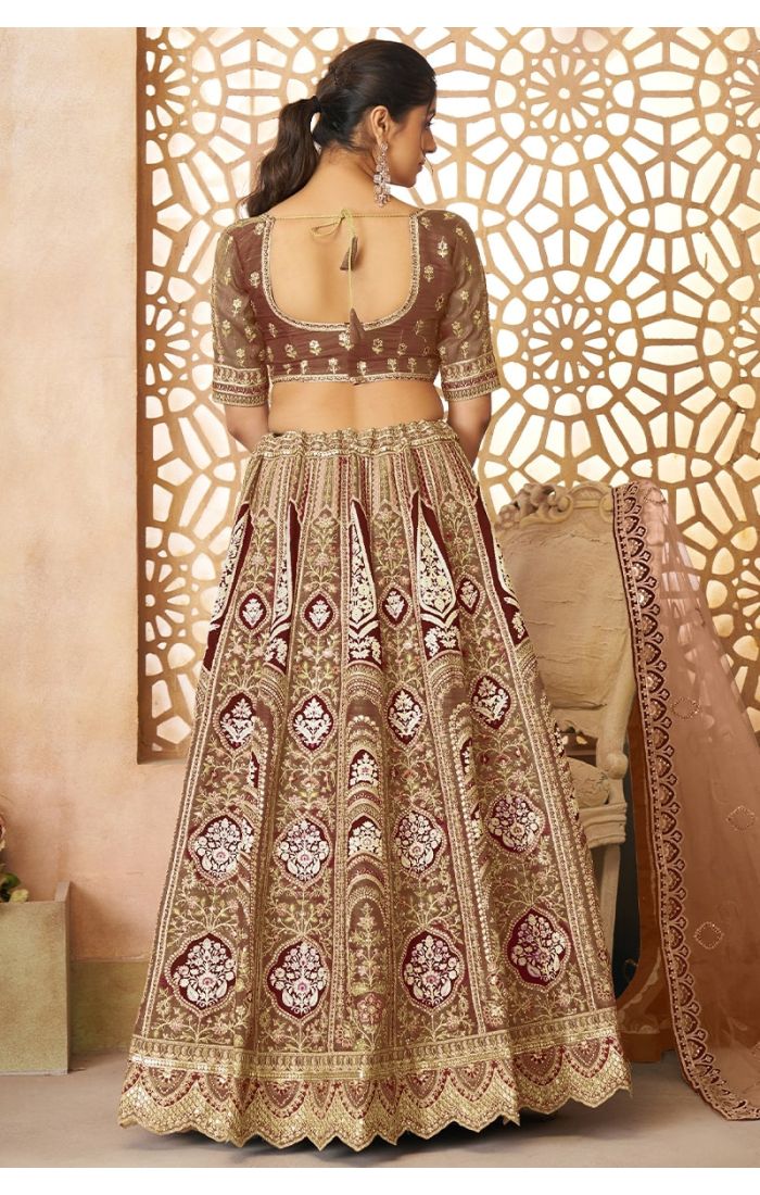 Back view of mocha Banarasi bridal lehenga with golden aari embroidery