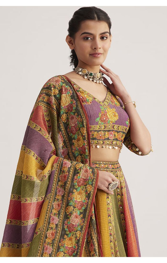 Close view of multi-color silk Navaratri lehenga choli set with printed floral design, V neck blouse and matching dupatta for festive and party wear