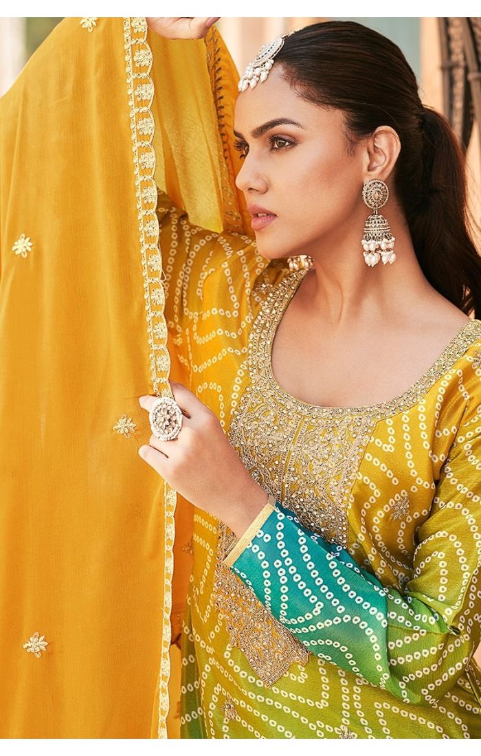 Detailed neckline embroidery and sleeve work on chinon fabric