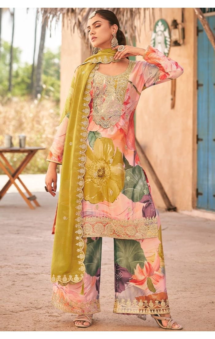  Side pose view featuring round neck design and flowing organza dupatta