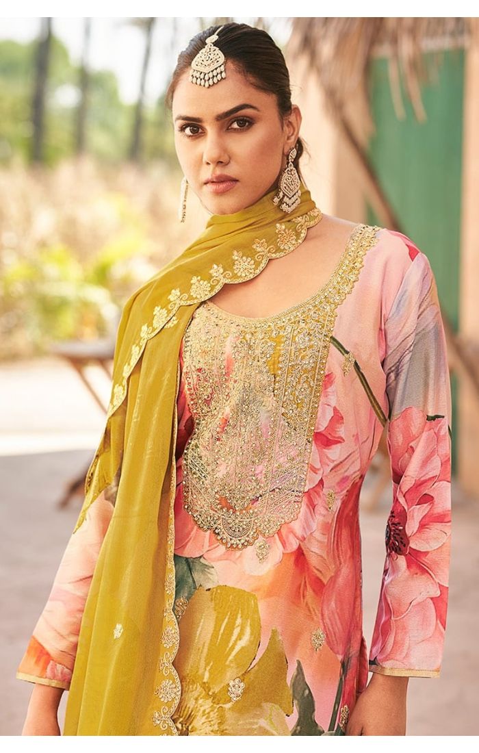 Close-up showcasing heavy thread embroidery, handwork, and vibrant digital print