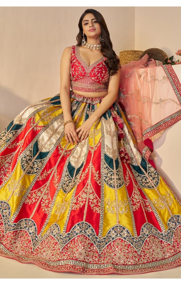 Sitting pose showing full flare of vibrant multicolor lehenga skirt – Appelle Fashion