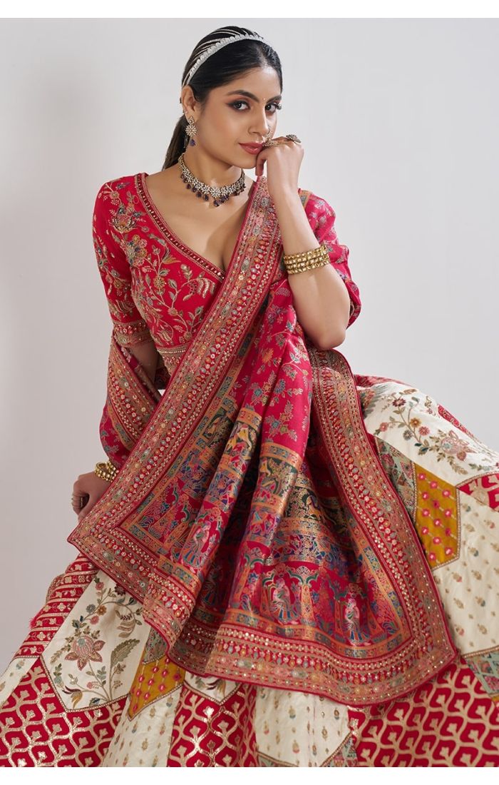 Close-up of embroidery and neckline on red Banarasi blouse with heavy bridal dupatta – USA ethnic fashion