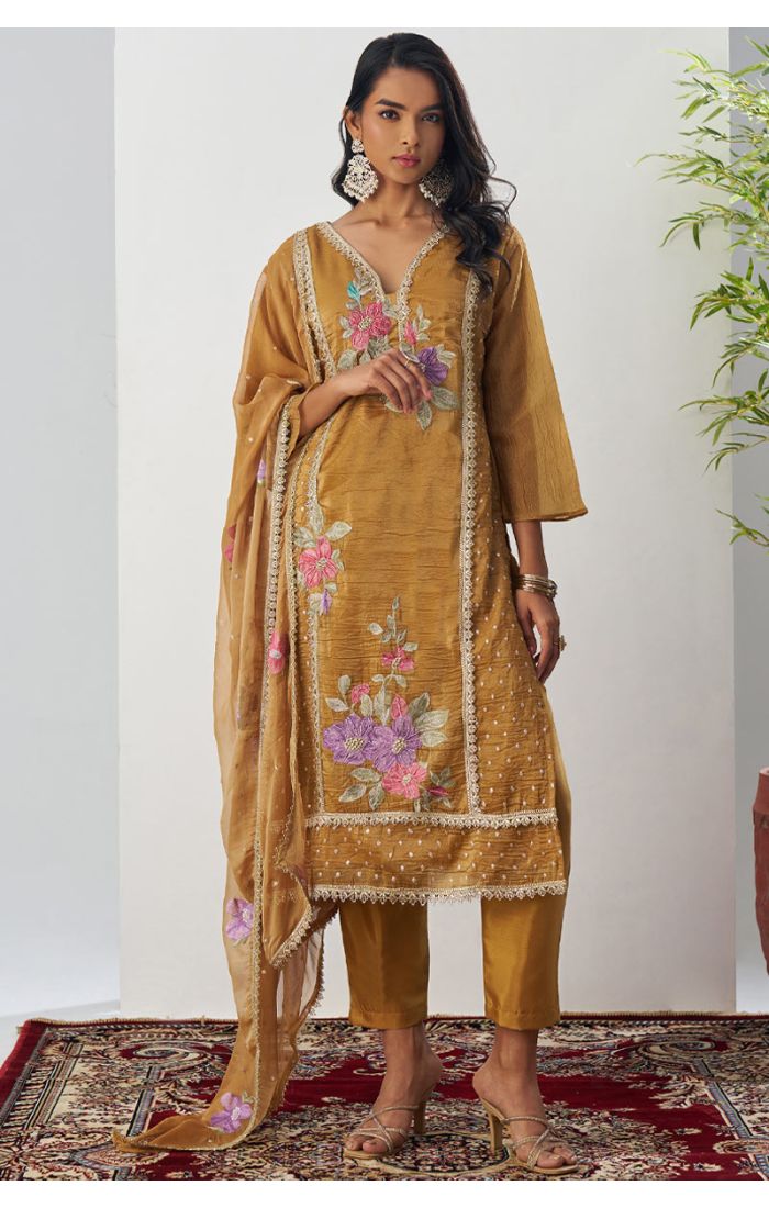 Pakistani style mustard crushed silk floral embroidered suit with V-neck, 3/4 sleeves, straight pants, and matching embroidered dupatta