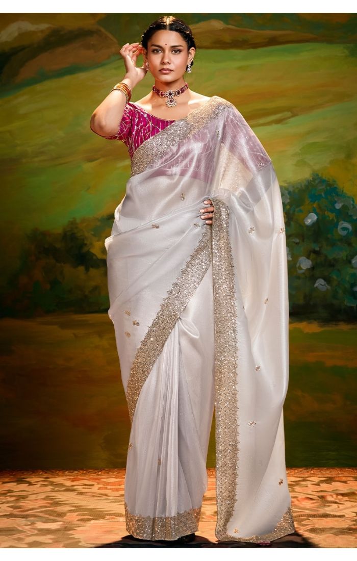  Off white organza saree front view with pink raw silk blouse