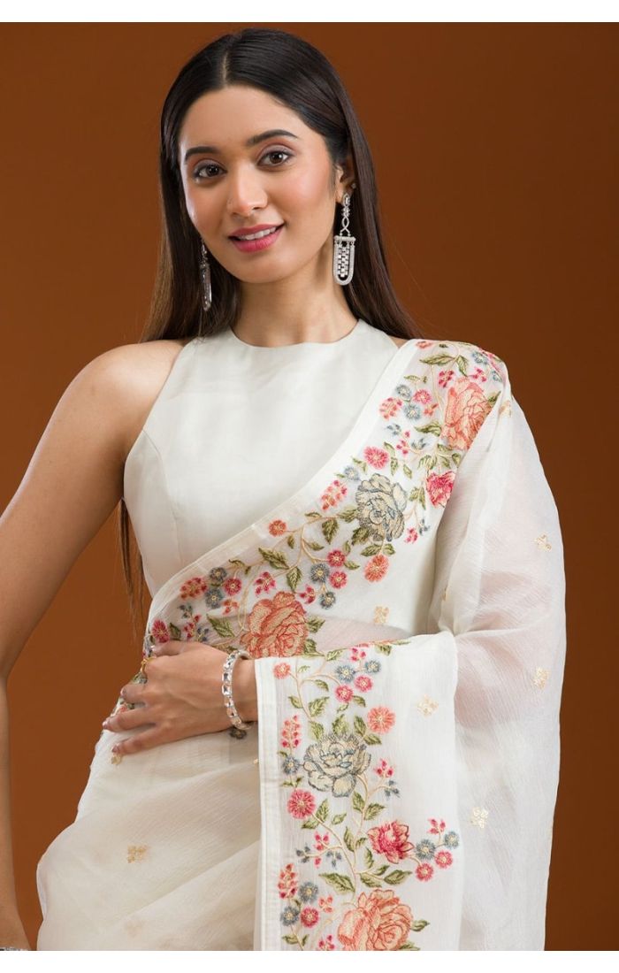 Close-up of piping lace and multi-thread embroidery