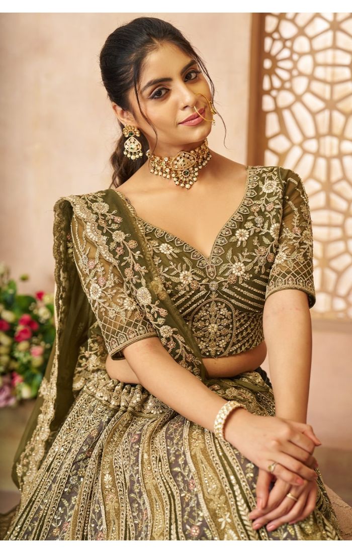 Close-up of choli and dupatta with sequin and thread work in bridal lehenga